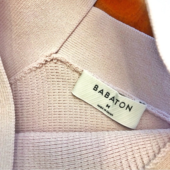 Aritzia BABATON Sculpt Knit Crisscross Tank
Pink Minimalist Contemporary Top. - Picture 2 of 8